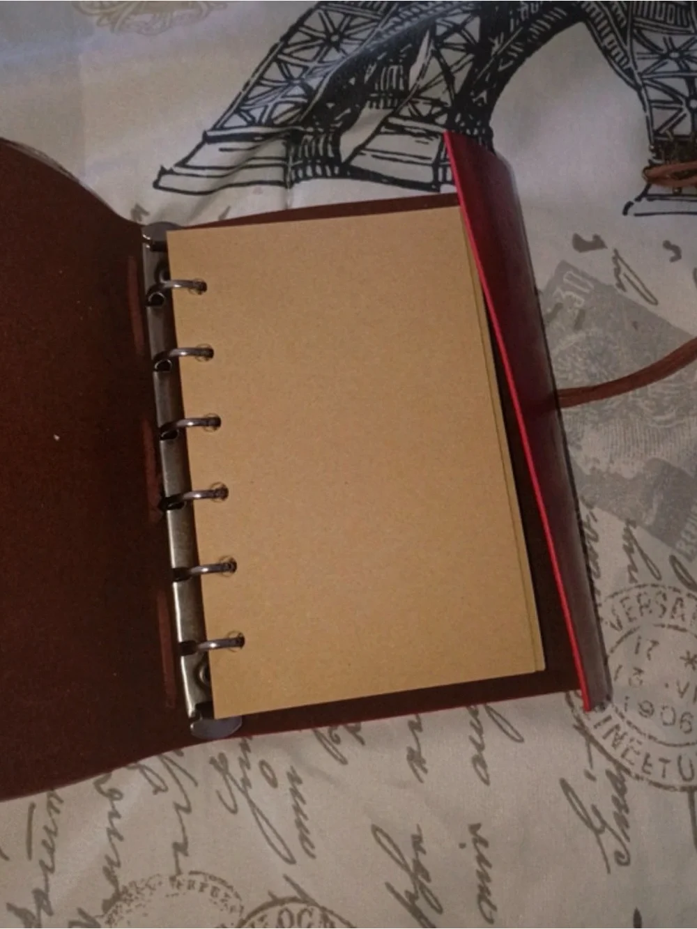 Burgundy Faux Leather Travel Journal Notebook with Compass Motif.